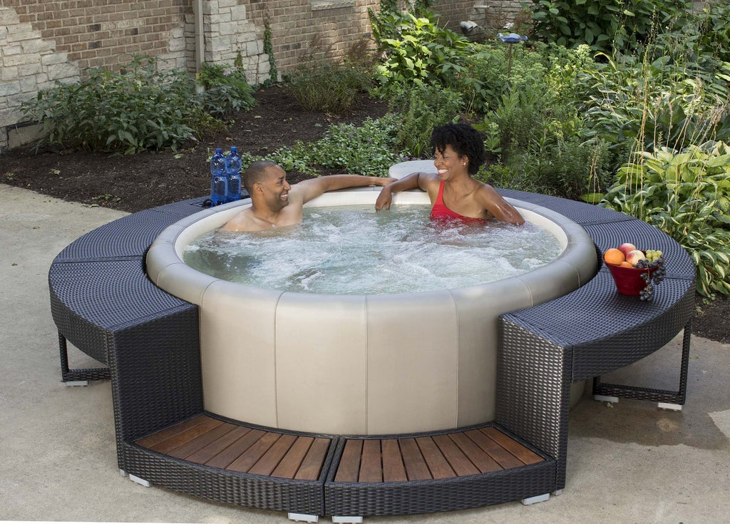 People in a Softub portable spa